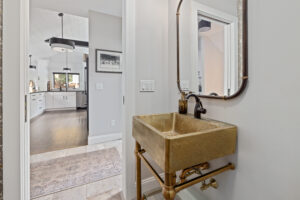 New Hampshire Hallway Bathroom Remodel with Metal Sink