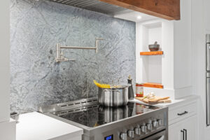 kitchen renovation with retractable wall faucet